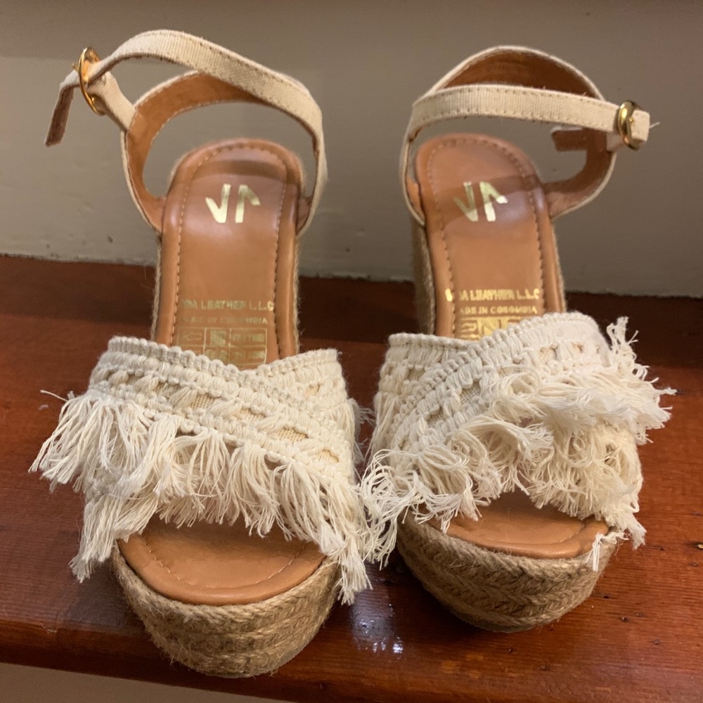 Wedge sandals never been used.